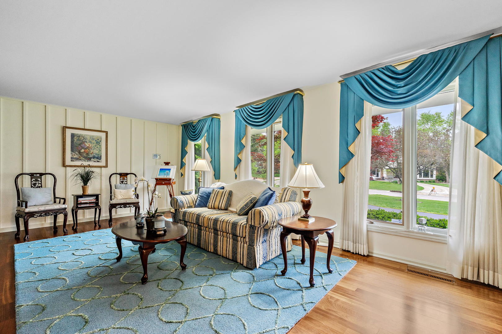9 Hampton Drive Oak Brook, IL 60523 - Photo 6 of 27 a living room with furniture and a large window