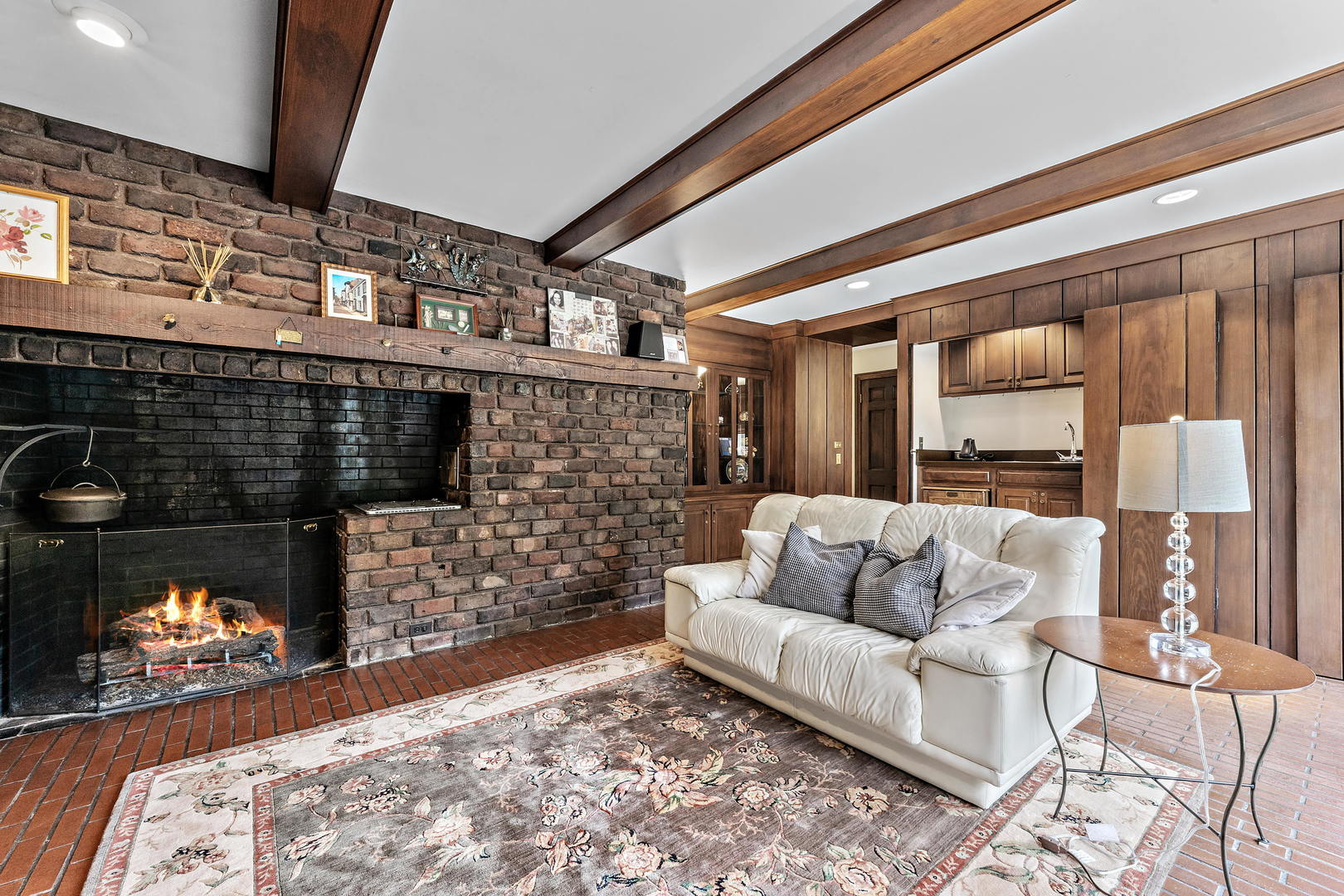 9 Hampton Drive Oak Brook, IL 60523 - Photo 9 of 27 a living room with furniture and a fireplace
