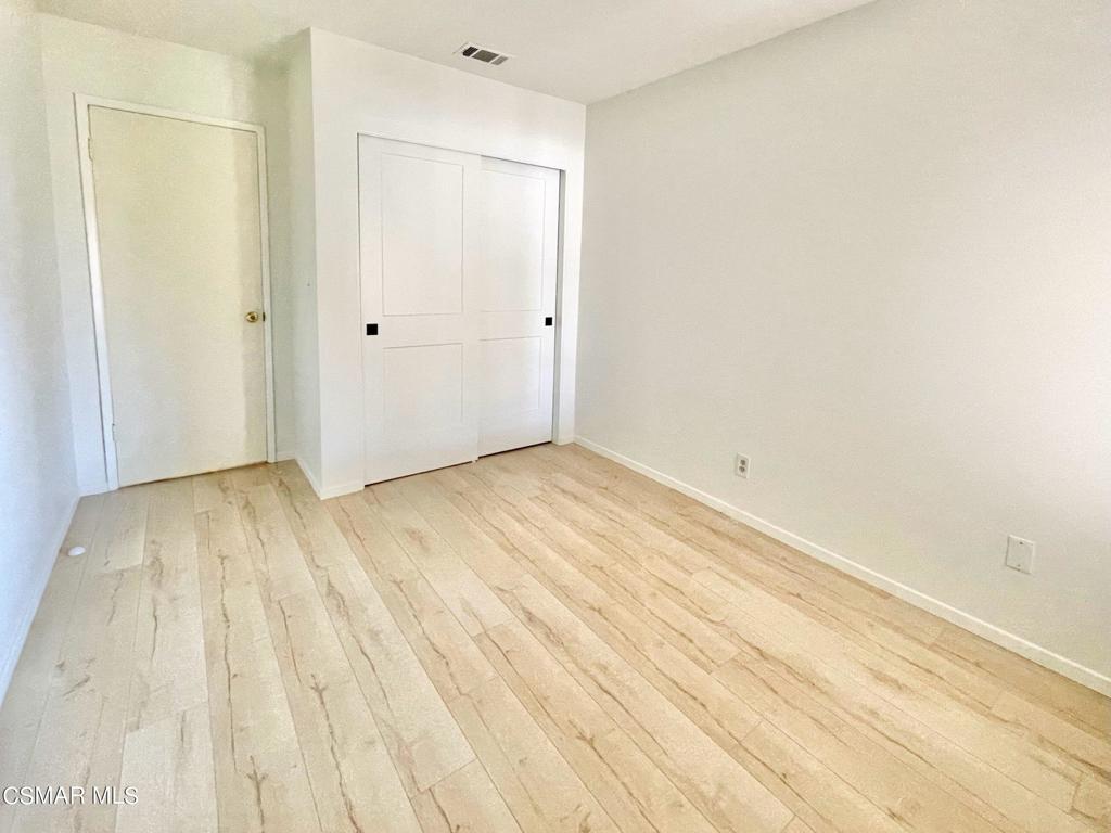 1594 Willowbrook Lane Simi Valley, CA 93065 - Photo 11 of 20 an empty room with wooden floor