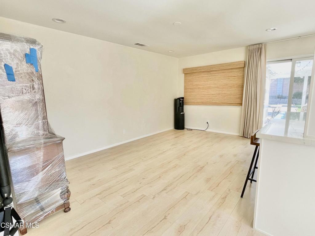 1594 Willowbrook Lane Simi Valley, CA 93065 - Photo 8 of 20 a view of a room with wooden floor and windows