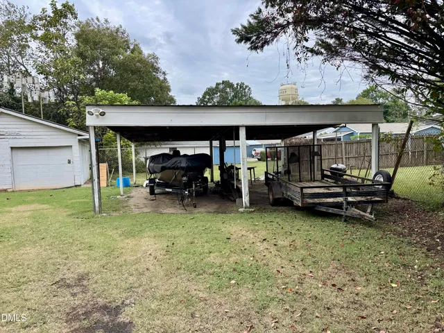 a view of a backyard with a garden