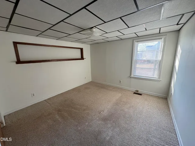 a view of a room with an empty space