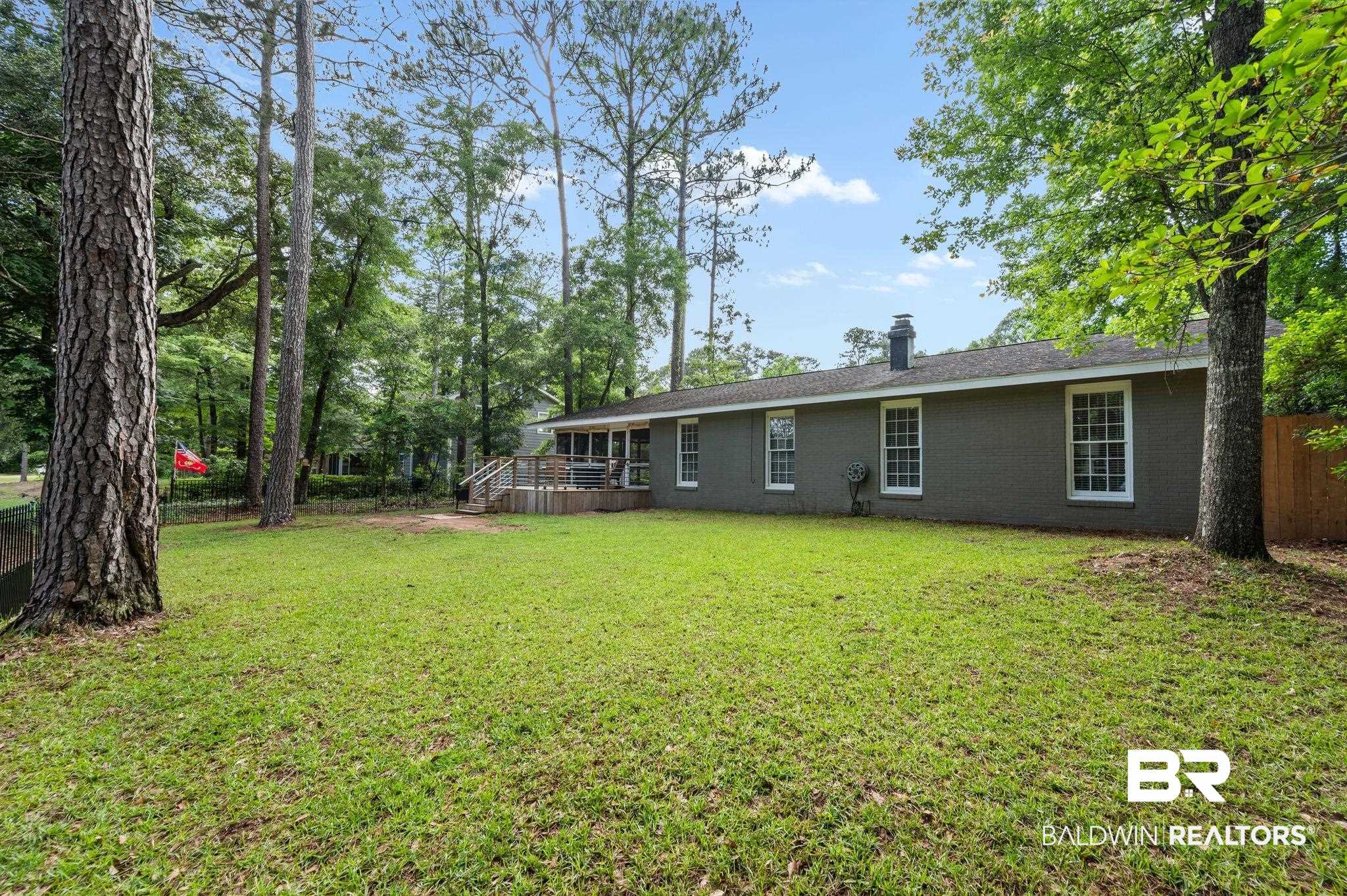 110 Ferncliff Circle Daphne, AL 36526 - Photo 35 of 40 View of green lawn featuring a wooden deck