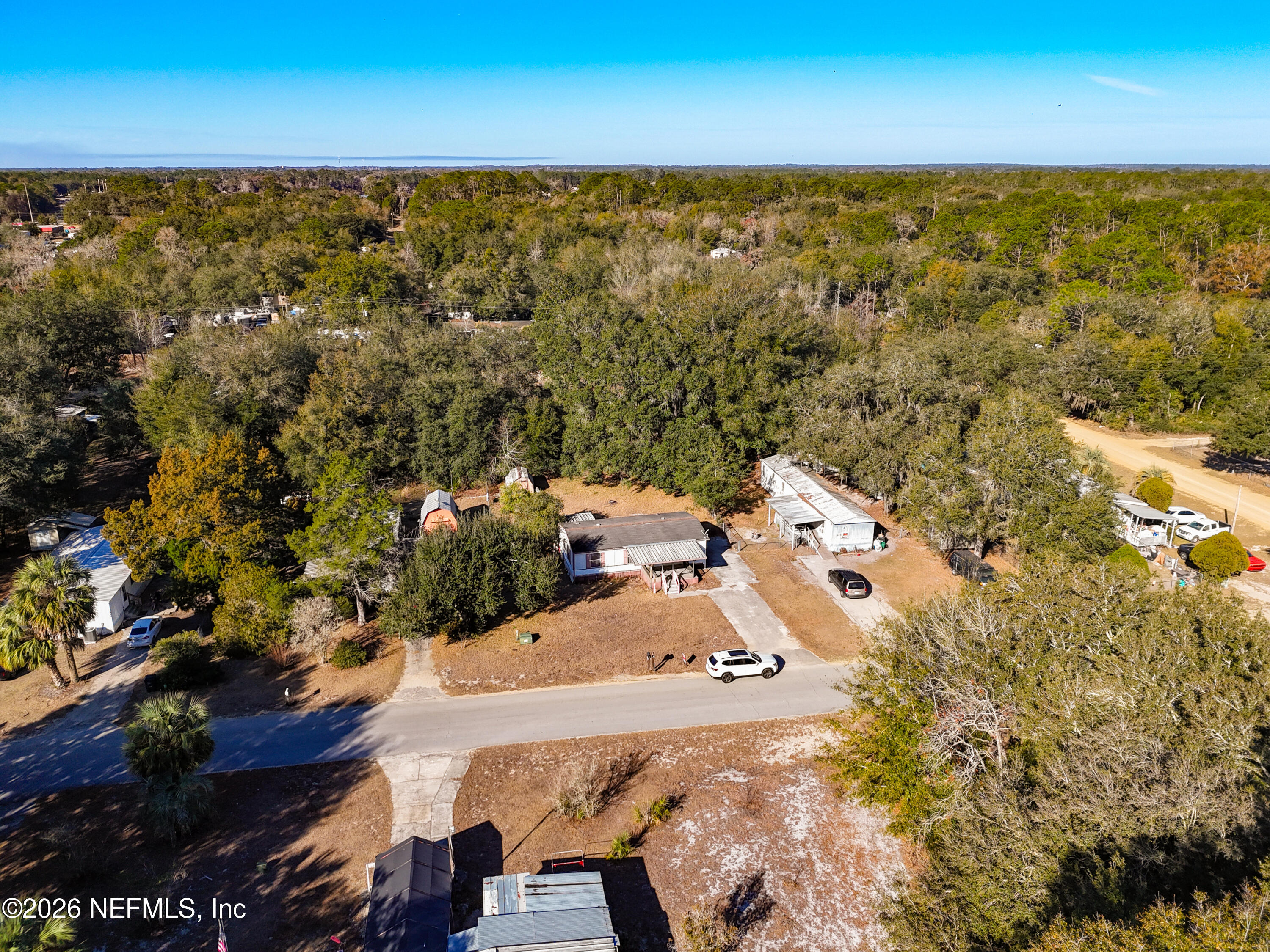 133 Reaves Avenue Interlachen, FL 32148 - Photo 37 of 38 an aerial view of residential houses with outdoor space