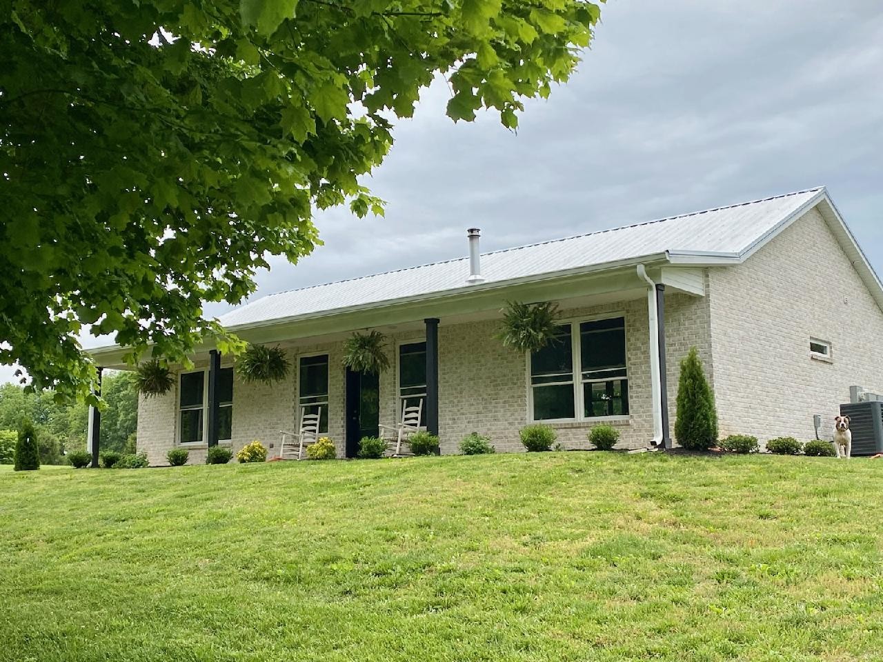 201 B Roberts Road Portland, TN 37148 - Photo 1 of 11 front view of a brick house with a yard