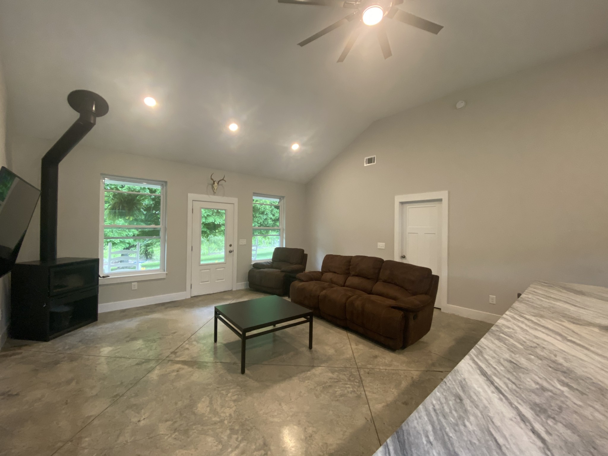 201 B Roberts Road Portland, TN 37148 - Photo 8 of 11 a living room with furniture and a flat screen tv