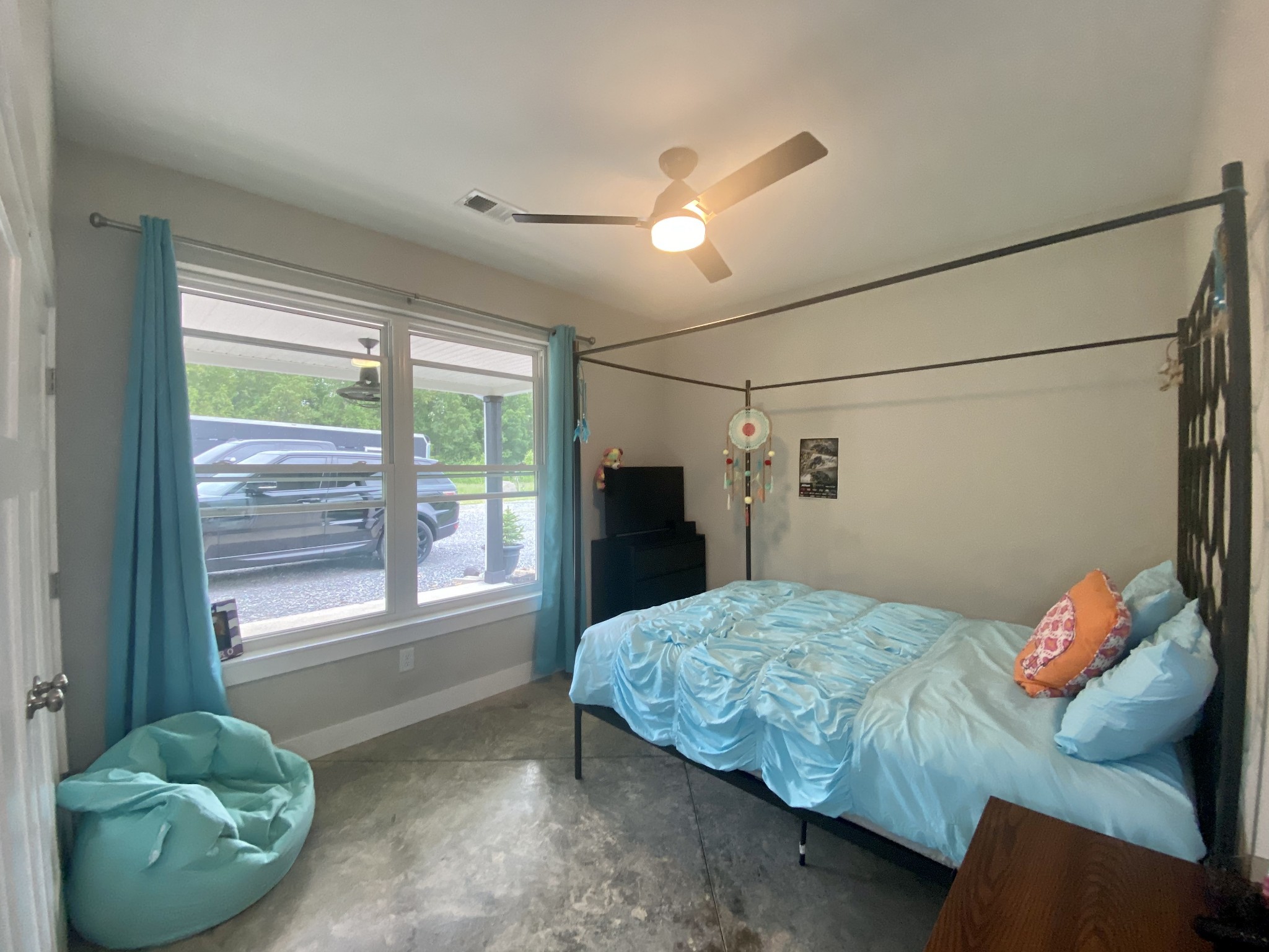 201 B Roberts Road Portland, TN 37148 - Photo 9 of 11 a bedroom with a bed and window