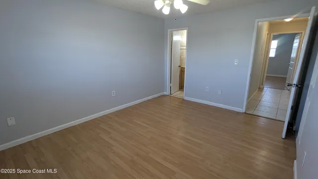 a bathroom with a toilet and a bathtub
