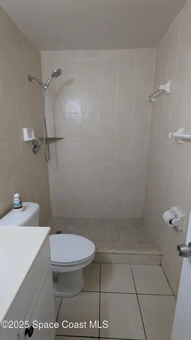 a view of swimming pool having outdoor seating