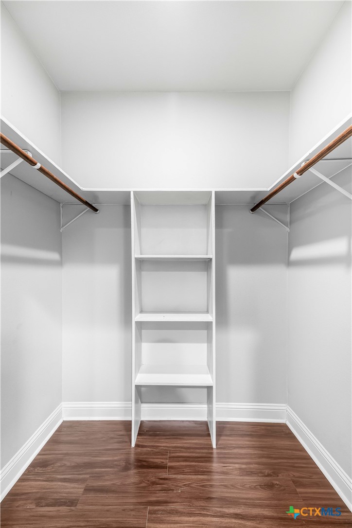 204 James Street Inez, TX 77968 - Photo 21 of 35 a view of an empty room with wooden floor and closet