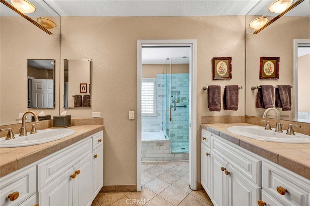 7710 East Strawberry Ridge Orange, CA 92869 - Photo 21 of 33 Separate vanity/sink areas in the primary bath.
