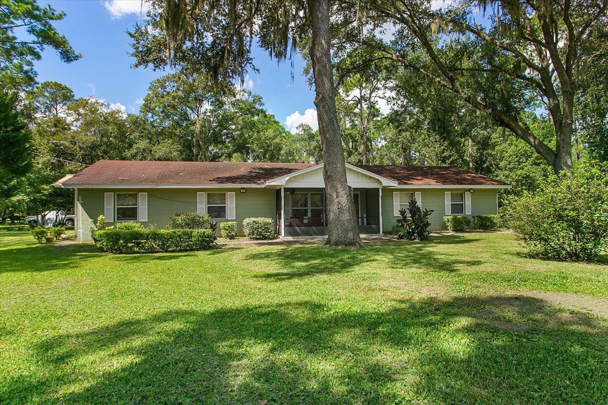 3351 Pacetti Road St. Augustine, FL 32092 - Photo 1 of 24 a front view of a house with garden