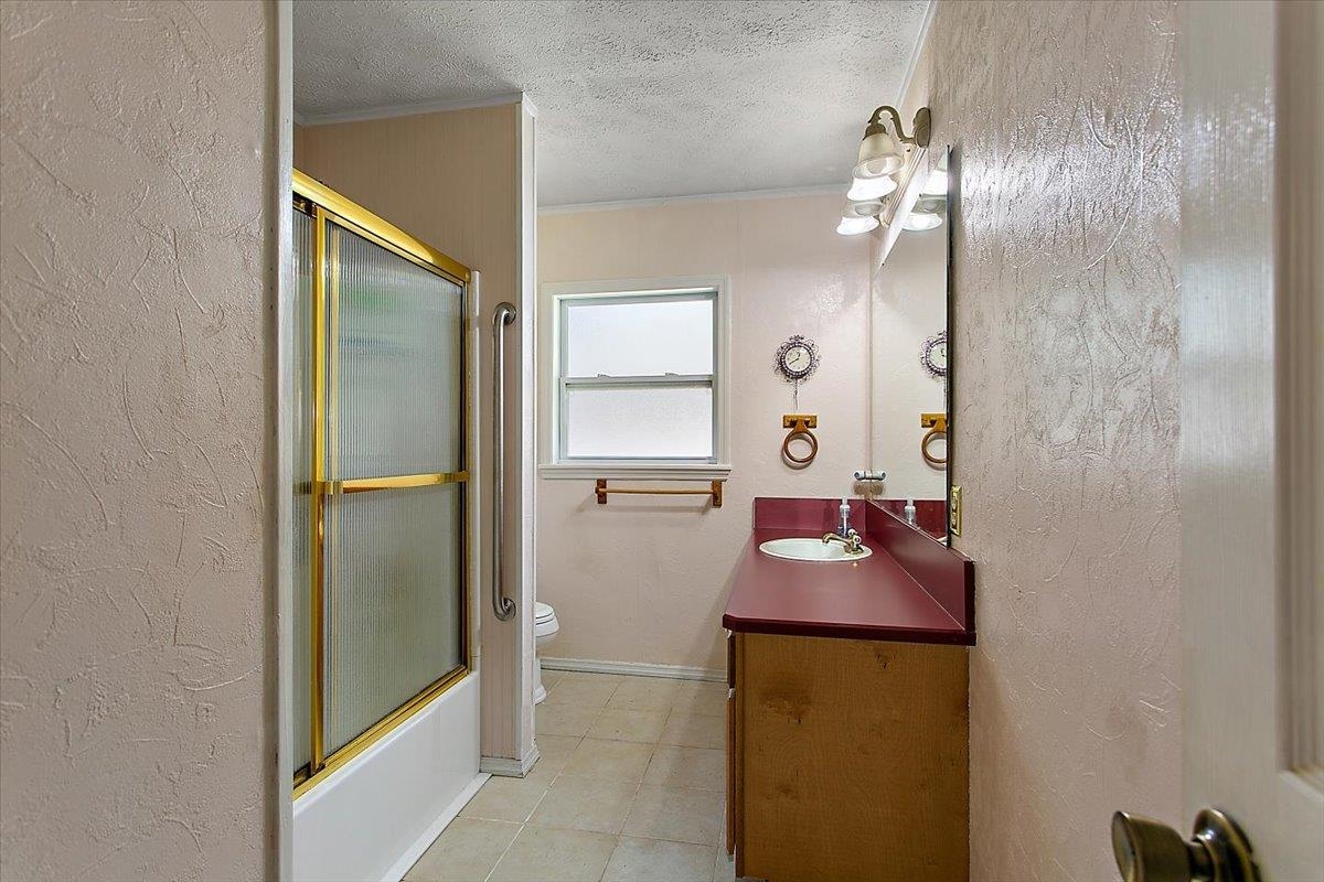 3351 Pacetti Road St. Augustine, FL 32092 - Photo 11 of 24 a bathroom with a sink and a mirror