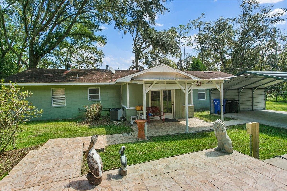 3351 Pacetti Road St. Augustine, FL 32092 - Photo 15 of 24 a front view of a house with garden