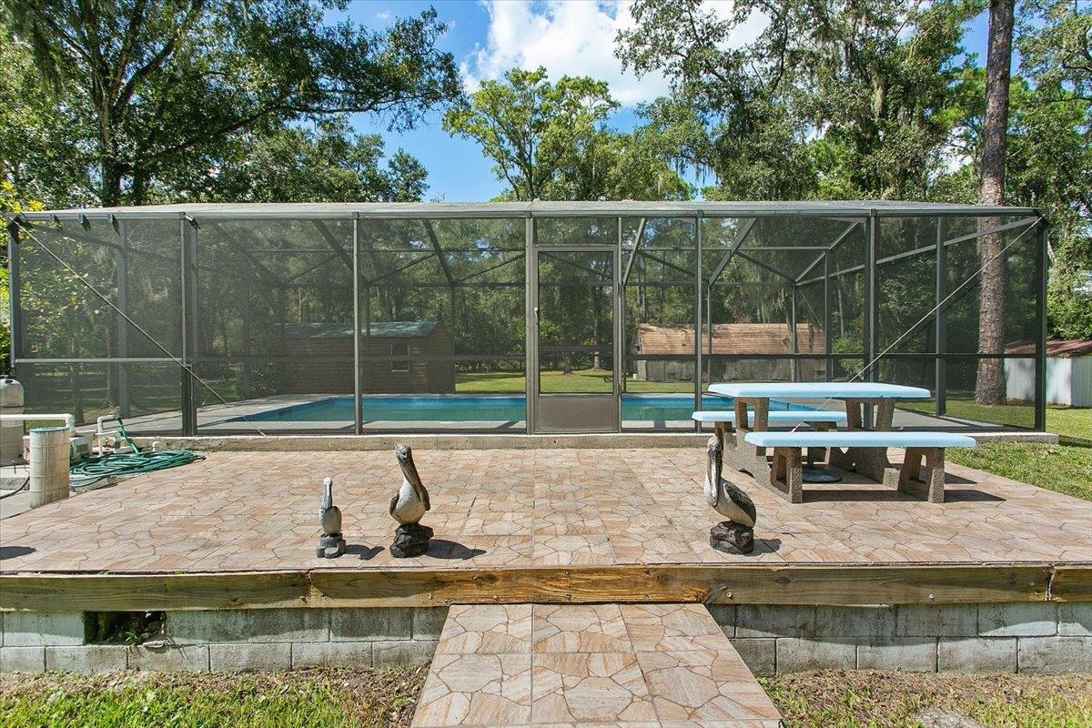 3351 Pacetti Road St. Augustine, FL 32092 - Photo 16 of 24 a view of house with a swimming pool