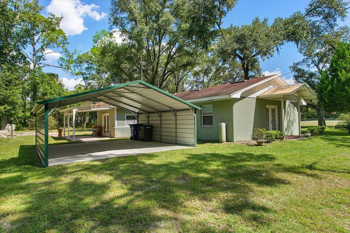 3351 Pacetti Road St. Augustine, FL 32092 - Photo 18 of 24 a front view of a house with a garden