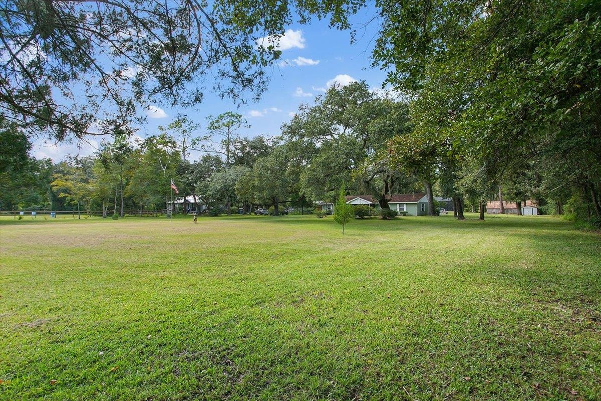 3351 Pacetti Road St. Augustine, FL 32092 - Photo 20 of 24 a view of outdoor space with deck and yard