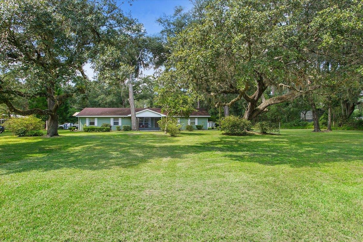3351 Pacetti Road St. Augustine, FL 32092 - Photo 21 of 24 a view of a house with a big yard