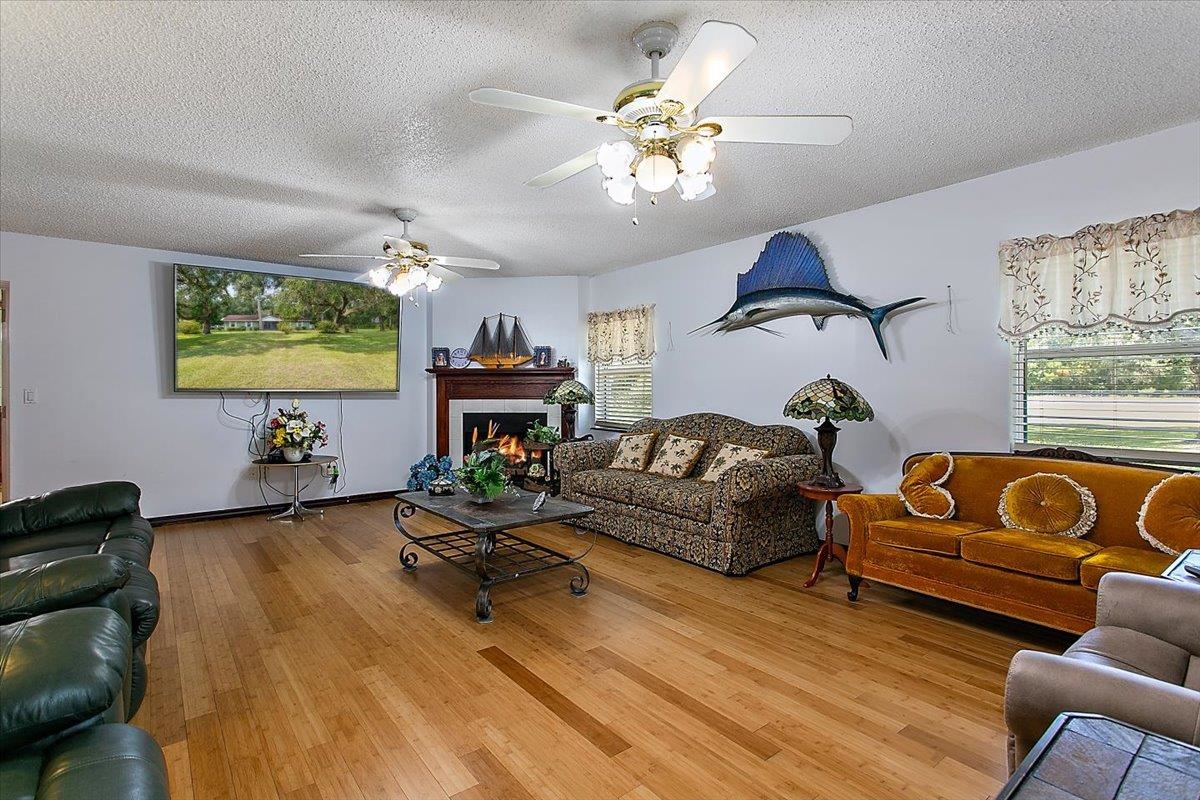 3351 Pacetti Road St. Augustine, FL 32092 - Photo 4 of 24 a living room with furniture and a flat screen tv