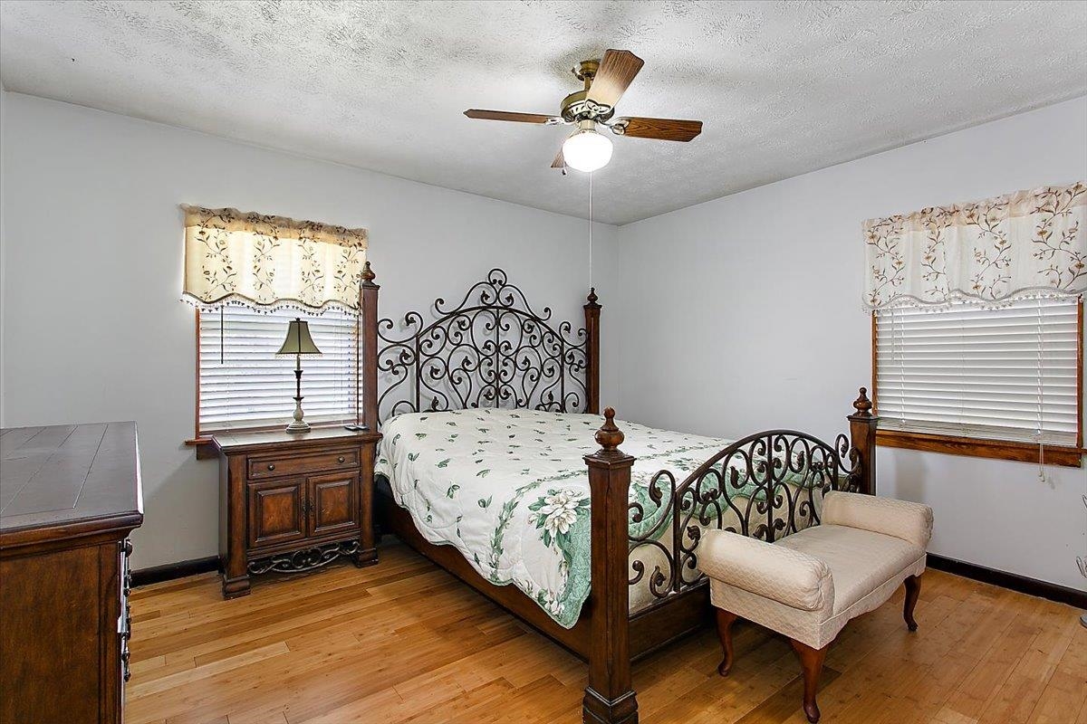 3351 Pacetti Road St. Augustine, FL 32092 - Photo 10 of 24 a bedroom with a bed a couch and a window