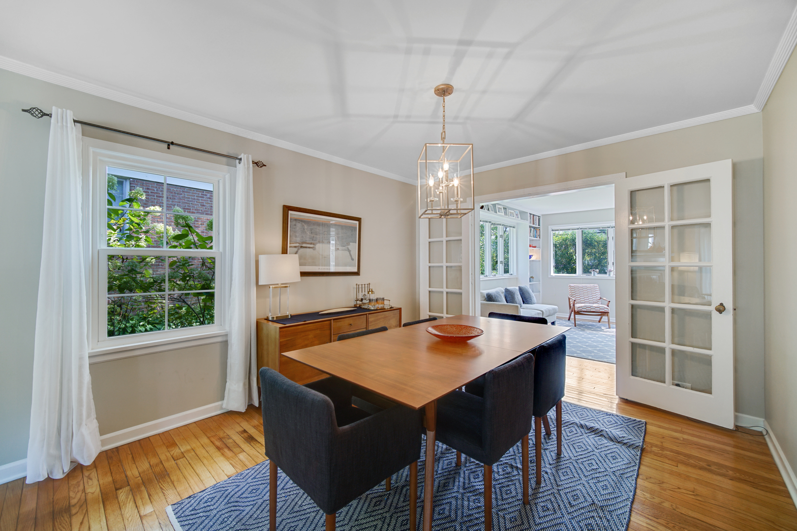 92 Williamsburg Road Evanston, IL 60203 - Photo 5 of 14 a view of a dining room with furniture window and wooden floor