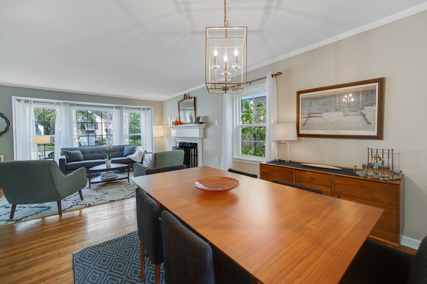 92 Williamsburg Road Evanston, IL 60203 - Photo 6 of 14 a living room with dining table furniture and a fireplace