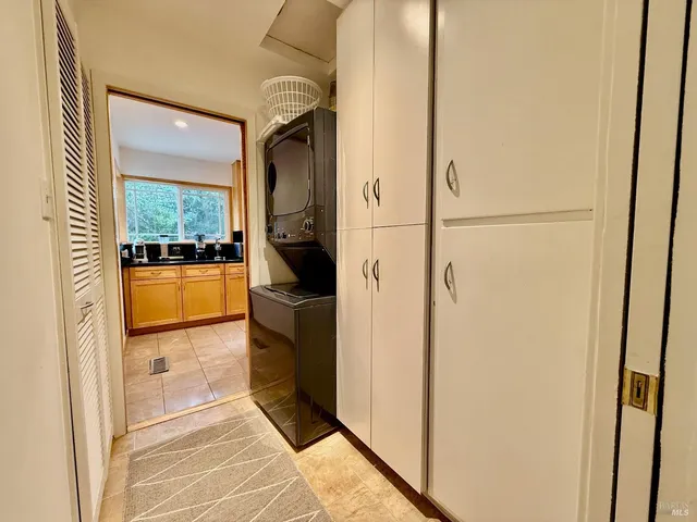 a view of a walk in closet and bedroom