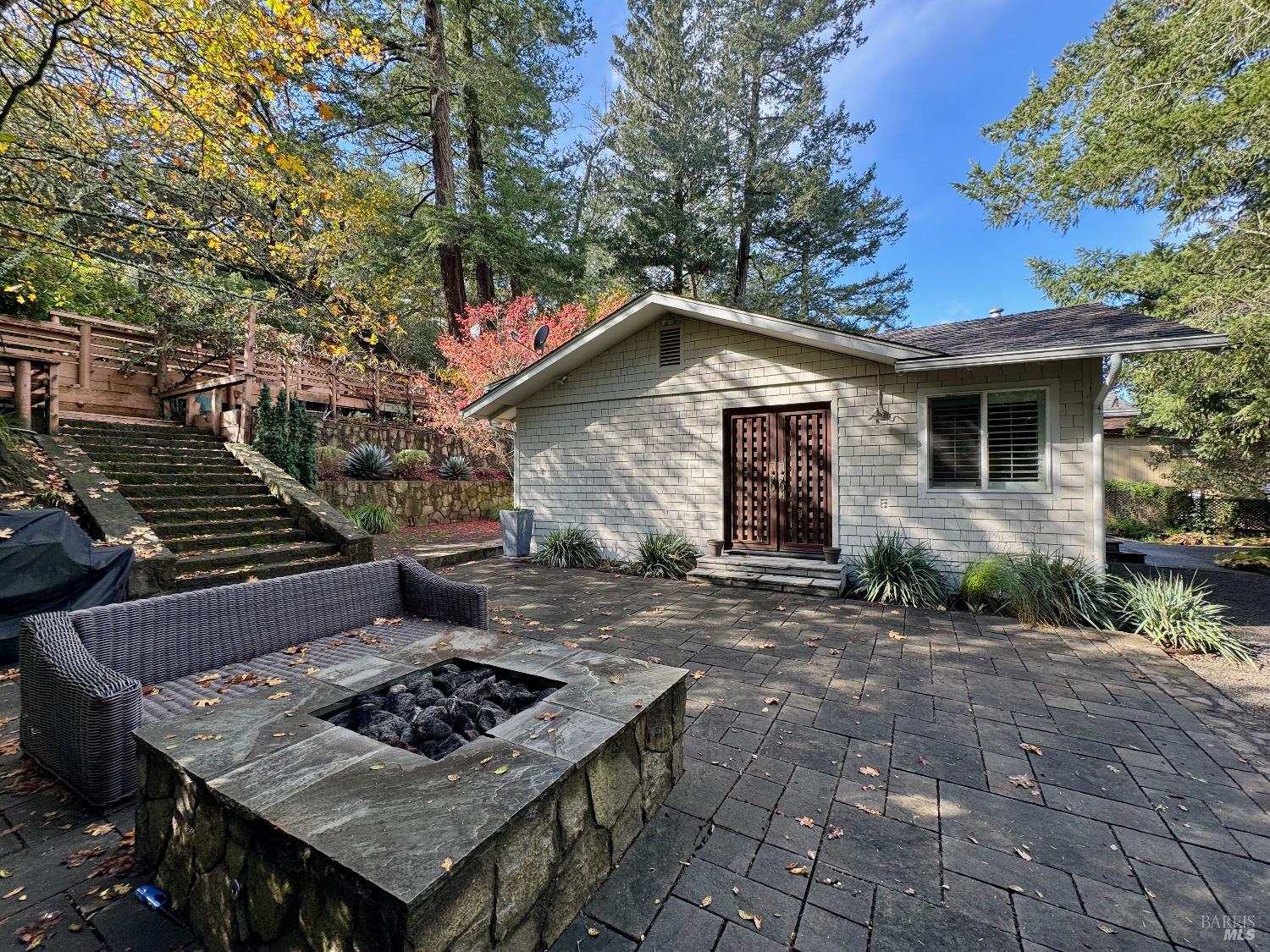 1607 Foothill Boulevard Calistoga, CA 94515 - Photo 23 of 27 a front view of house with yard outdoor seating and barbeque oven