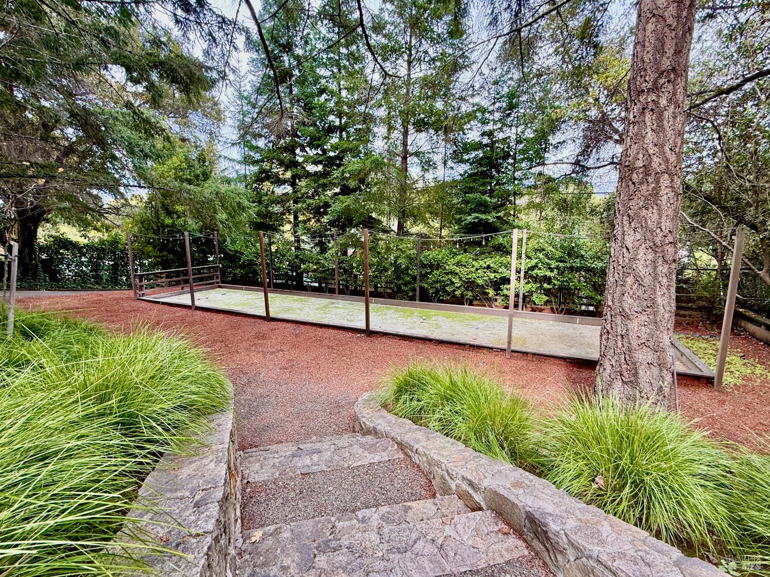 1607 Foothill Boulevard Calistoga, CA 94515 - Photo 25 of 27 a view of a garden with a slide