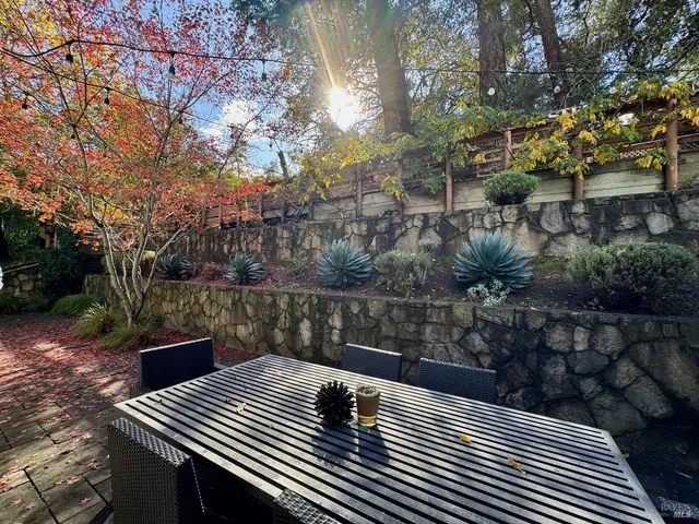 a view of a terrace with sitting area