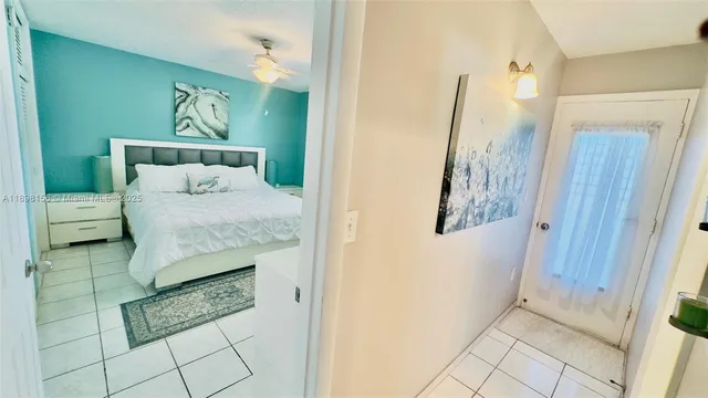 a bathroom with a sink a mirror and a shower