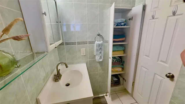 a swimming pool with outdoor seating and yard