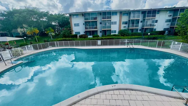 a view of balcony with small garden