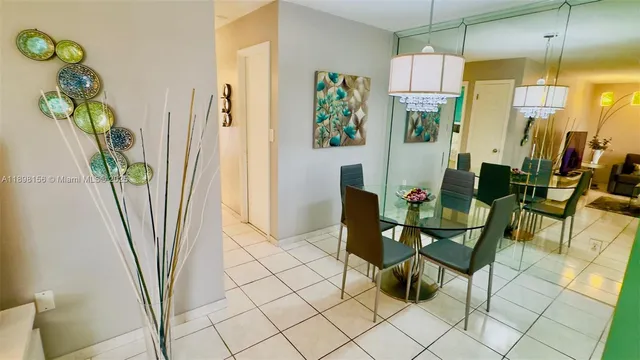 a view of kitchen with furniture and large window