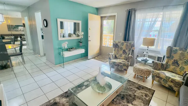 a living room with furniture and a table