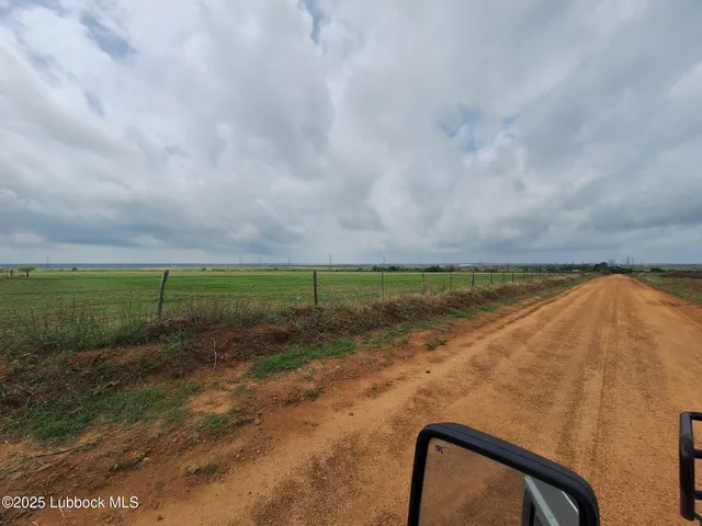 a view of a lake with a big yard