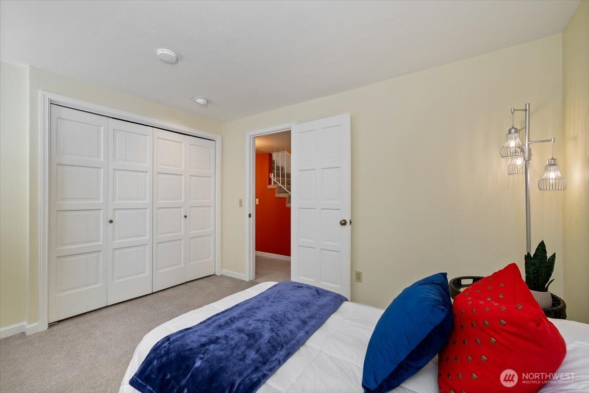 2606 49th Place Southwest Everett, WA 98203 - Photo 21 of 37 a bedroom with a bed and a closet