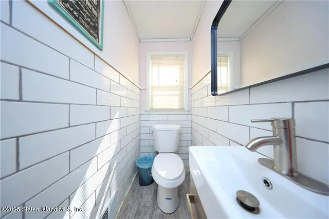 a bathroom with a sink and a toilet