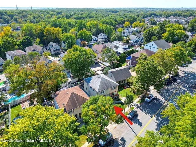an aerial view of residential house with outdoor space