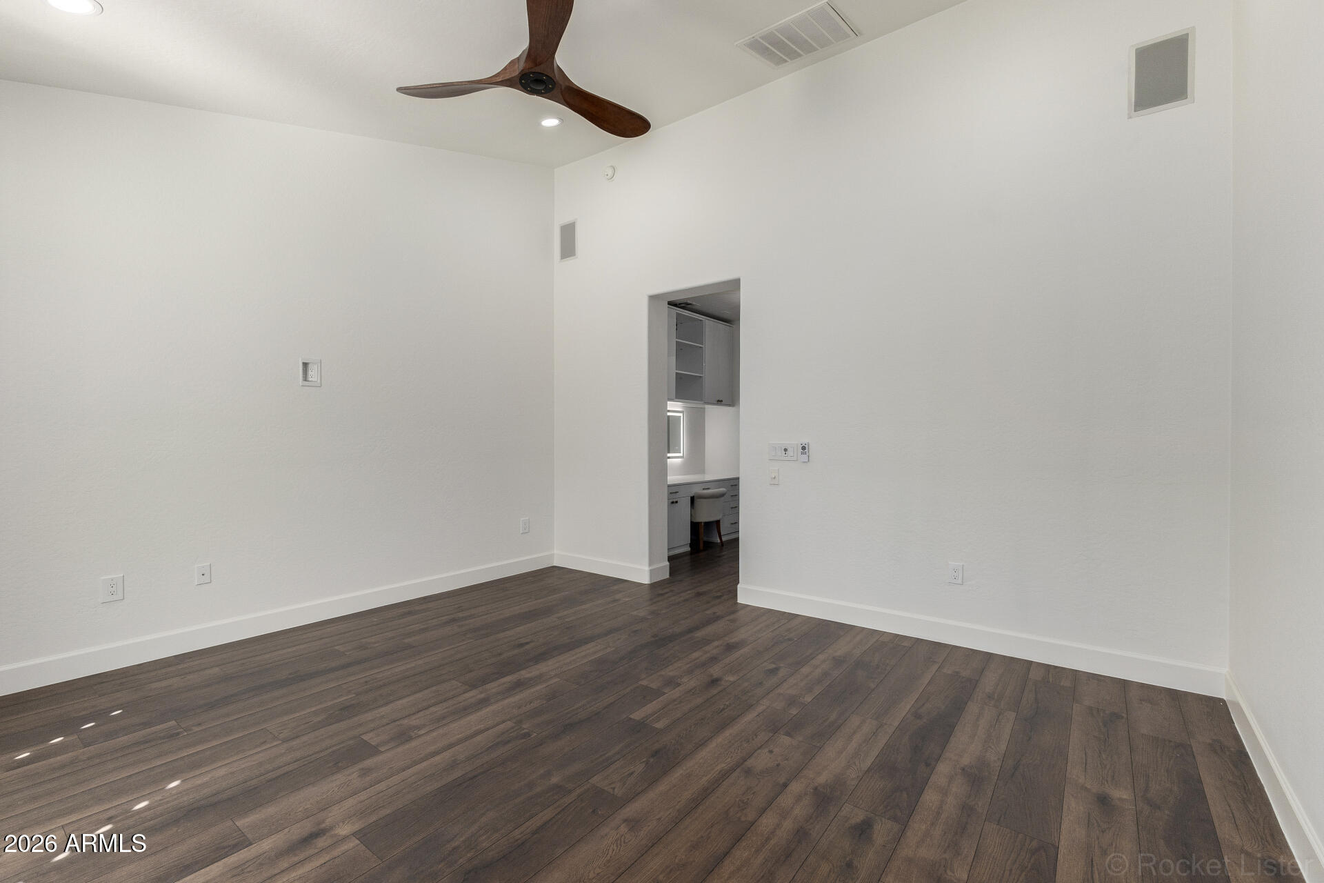 4424 North 24th Way Phoenix, AZ 85016 - Photo 13 of 39 a view of empty room with wooden floor