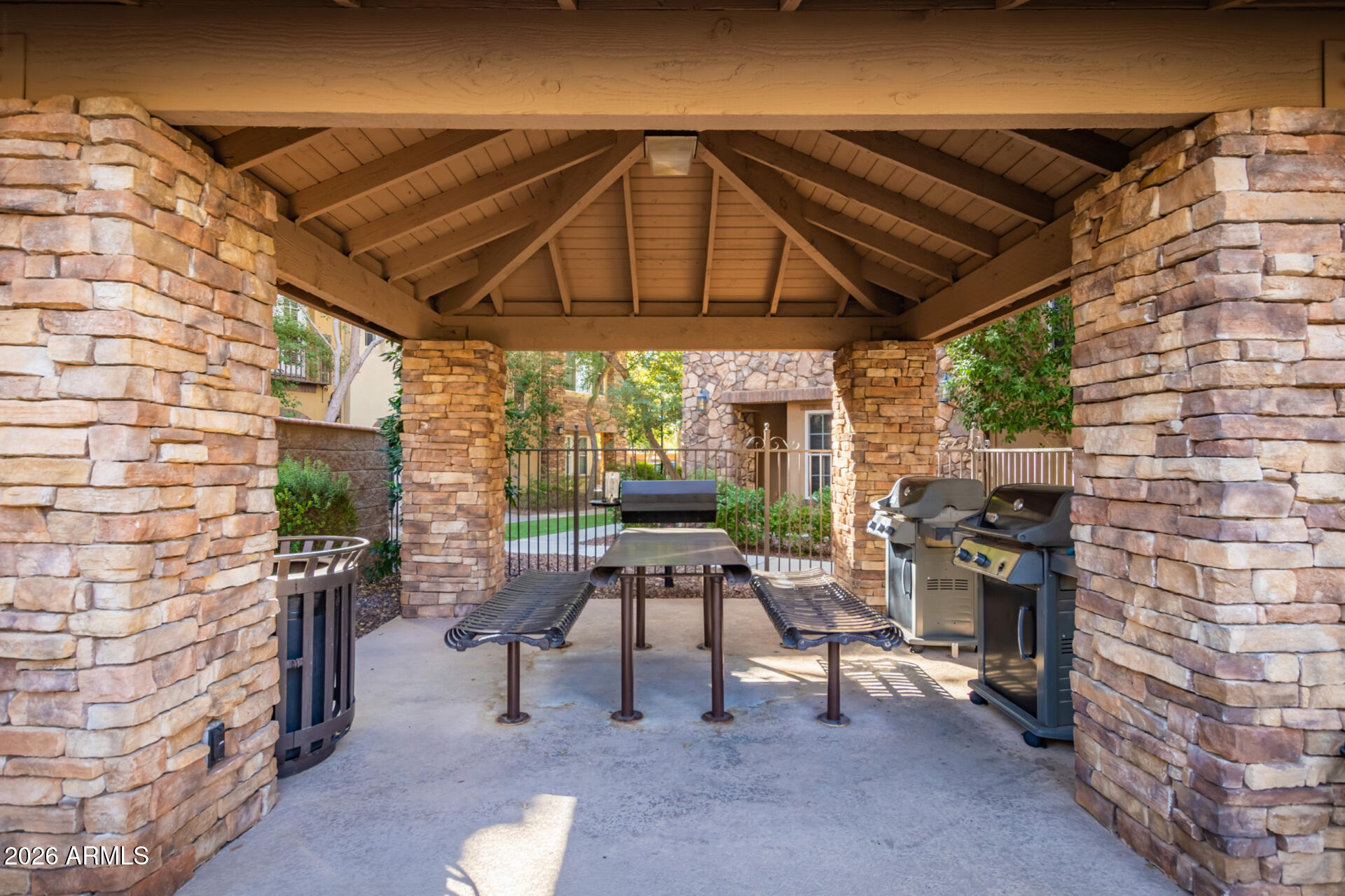 4424 North 24th Way Phoenix, AZ 85016 - Photo 37 of 39 a patio with table and chairs and potted plants