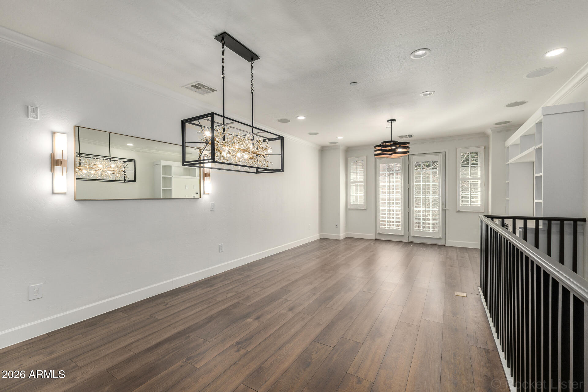 4424 North 24th Way Phoenix, AZ 85016 - Photo 4 of 39 a view of a room with wooden floor and windows