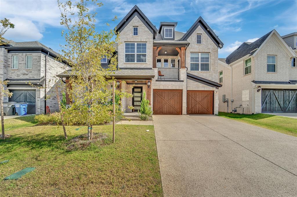 3520 Helios Lane Corinth, TX 76208 - Photo 2 of 37 Modern exterior with light brick and dark trim