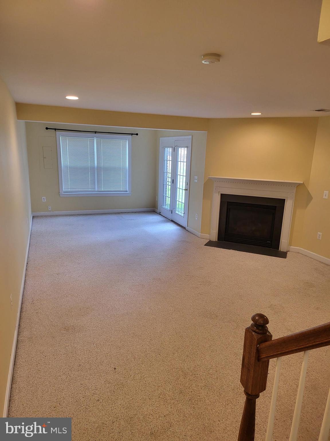 6161 Popes Creek Place Haymarket, VA 20169 - Photo 19 of 23 a view of empty room with a fireplace
