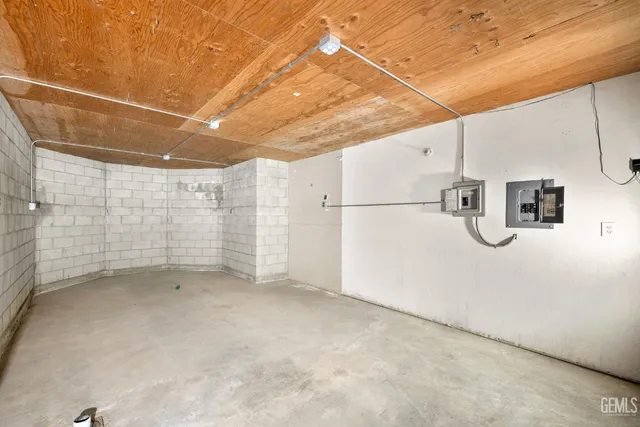 a view of a lush green hillside and houses