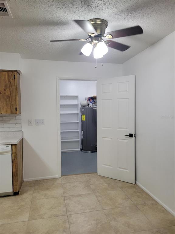 1112 5th Street Port Orange, FL 32129 - Photo 17 of 21 a view of an empty room with a fireplace