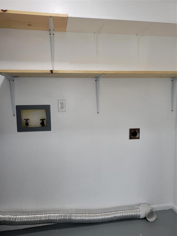 1112 5th Street Port Orange, FL 32129 - Photo 19 of 21 a view of cupboard