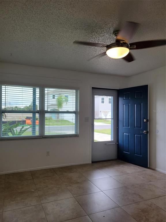 1112 5th Street Port Orange, FL 32129 - Photo 2 of 21 a view of an empty room and window