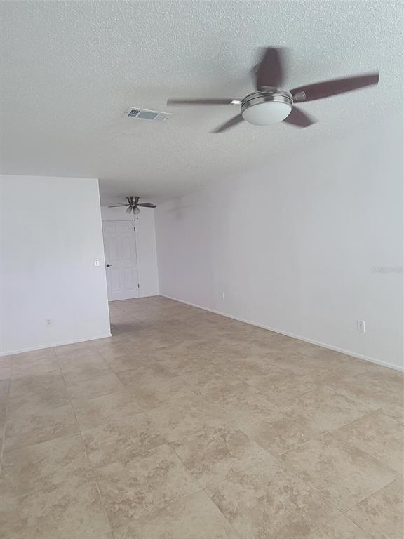1112 5th Street Port Orange, FL 32129 - Photo 4 of 21 a view of a room with an empty space
