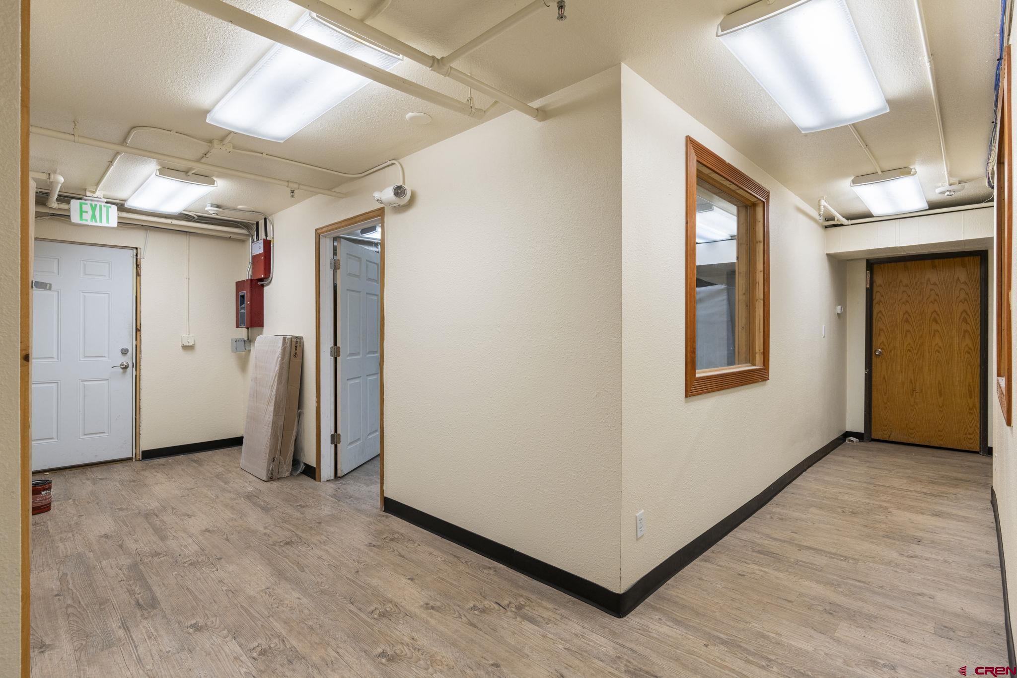 3206 Main Avenue Durango, CO 81301 - Photo 34 of 45 a view of a hallway with wooden floor and closet